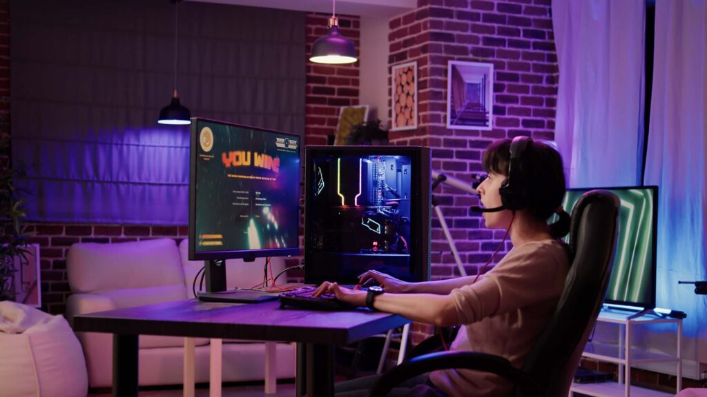 Caucasian woman celebrating winning first place in action game online multiplayer competition